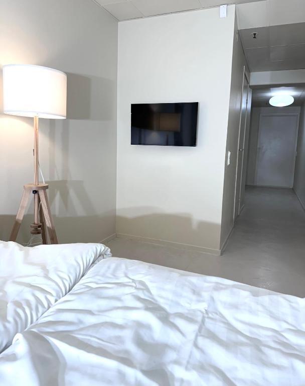 Habitación Cuádruple - 2 Camas Individuales - 1 Sofá Cama - Baño Privado