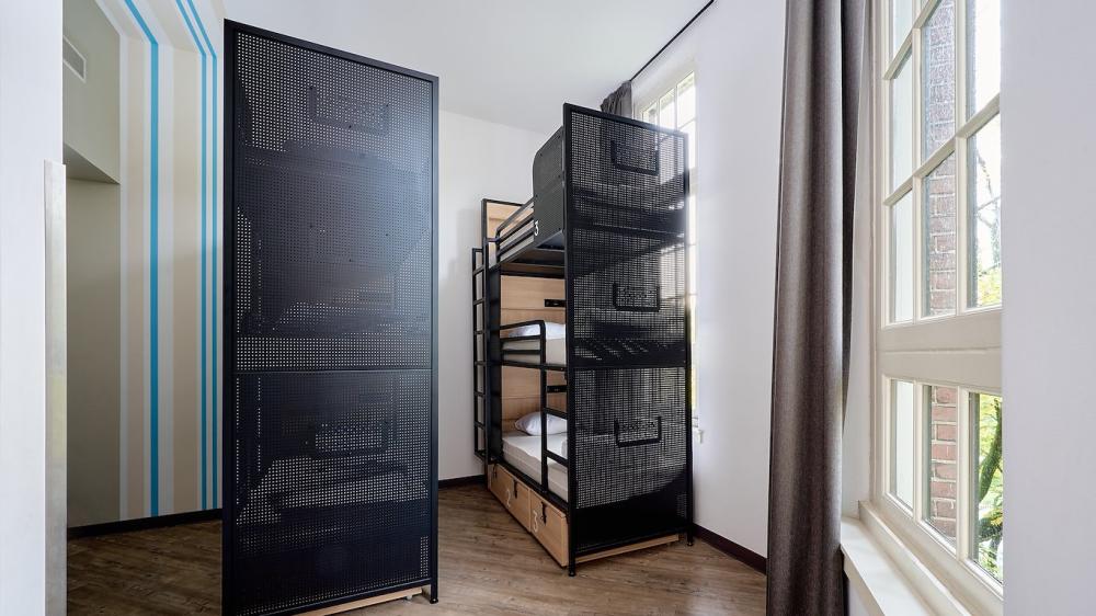 Cama en dormitorio de 6 camas - Baño privado
